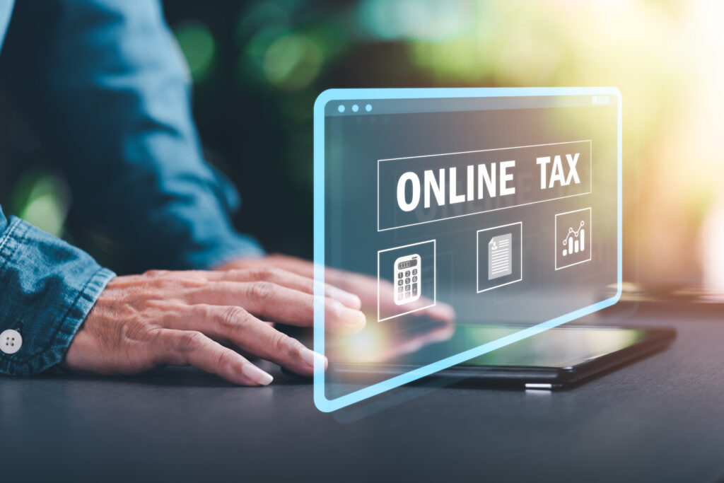 businessman is managing documents online calculating tax rates business finance bu